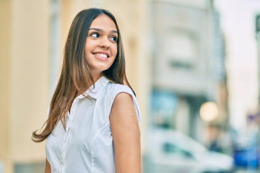 Smiling woman representing confidence after gum care in the Bethesda, MD community