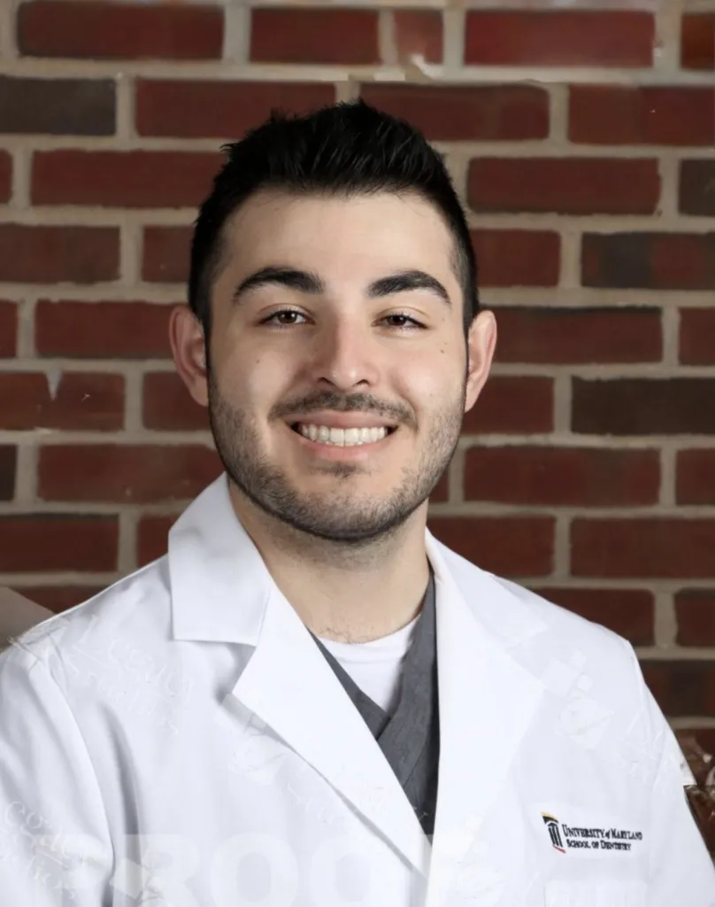 Portrait of Dr. Daniel Mazza wearing a white coat