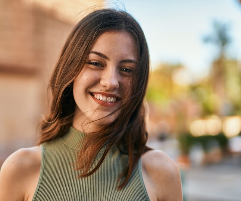 Smiling woman representing confidence after Maryland bridge treatment in Bethesda, MD