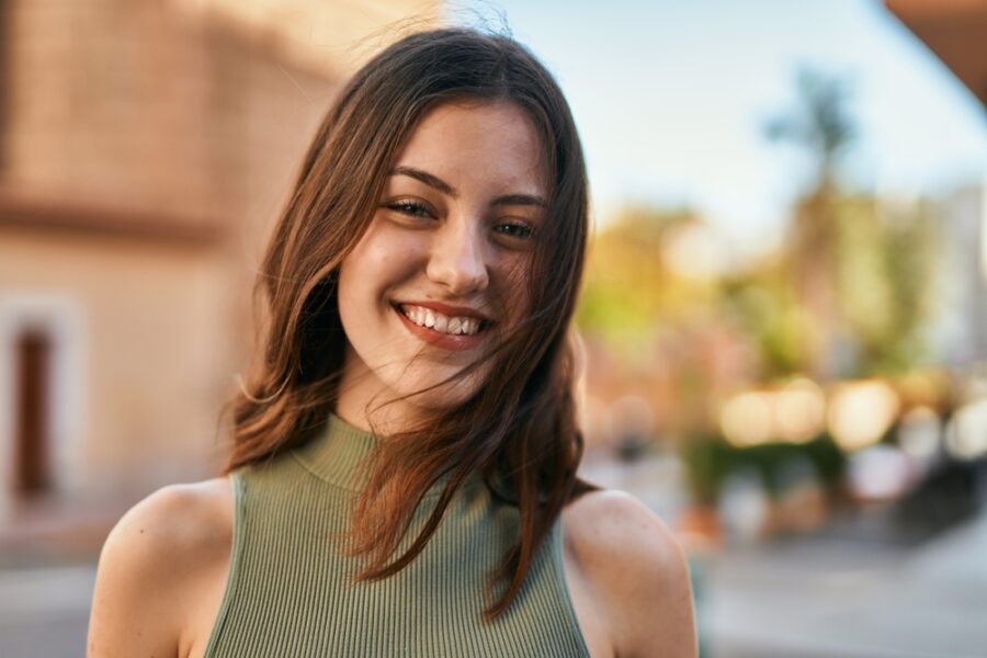 Smiling woman representing confidence after Maryland bridge treatment in Bethesda, MD